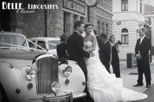 The classic cars and period building are suited to monochrome photos